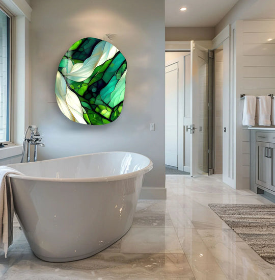An abstract oval green stained pattern glass wall art decor piece captivates with its organic, gem-like shapes.