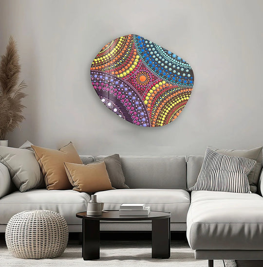 Detailed glass art painting showcases a vibrant mosaic of rainbow-colored dots arranged in organic shapes on a modern wall.