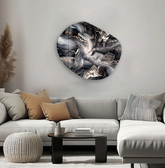 This abstract alcohol ink oval glass wall art features a cool, monochromatic palette with subtle warm gold accents, creating a sophisticated home decor piece.