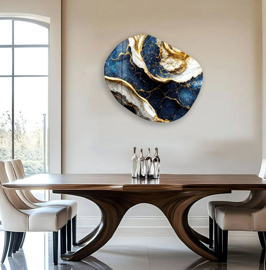 A unique navy marble decorative glass wall art piece with gold veining serves as the focal point.