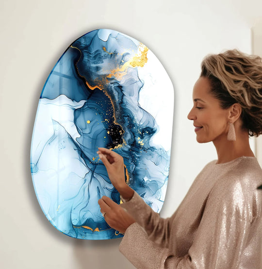 Abstract navy blue alcohol ink glass wall art with gold accents, creating a dynamic decorative wall art piece.