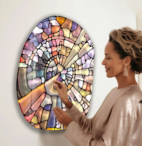 Geometric sections of colorful abstract glass wall art prints create a vibrant mosaic pattern.