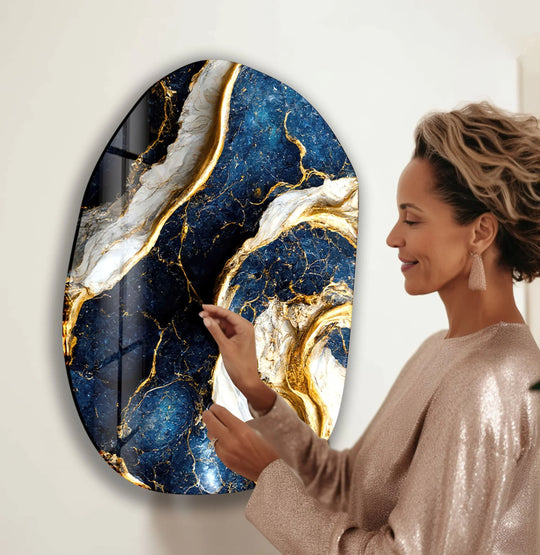 This navy marble decorative glass wall art features a glossy, polished finish with intricate gold veining.