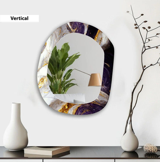 Reflected within the purple and white wall mirror, the room's softest element is the diffuse light of a table lamp, giving the framed wall mirror a warm glow.