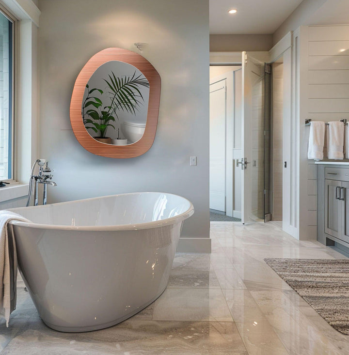 Wall mirrors with artistic frames that serve as both functional and decorative pieces
