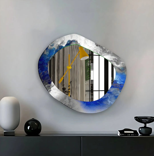 Shadows define the asymmetrical blue silver marble wall mirror, reflected within its surface alongside a standing lamp, creating a dynamic composition with light for decorating with wall mirrors.