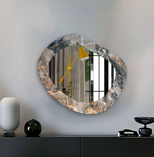 Warm color temperatures accentuate the marble pattern of this asymmetric modern mirror, reflecting a bright yellow lamp and adding a stylish touch.