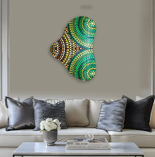 Vibrant green and yellow dots create a striking color contrast on this asymmetrical glass print wall art.