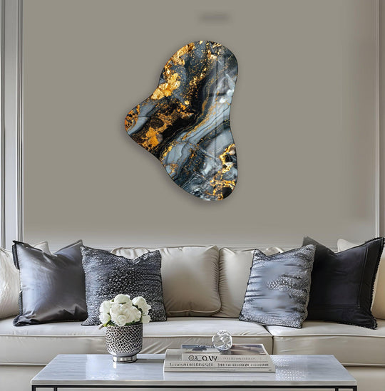 Abstract decorative wall art with soft, flowing gold-accented gray marbled glass evokes gentle movement and luxury.