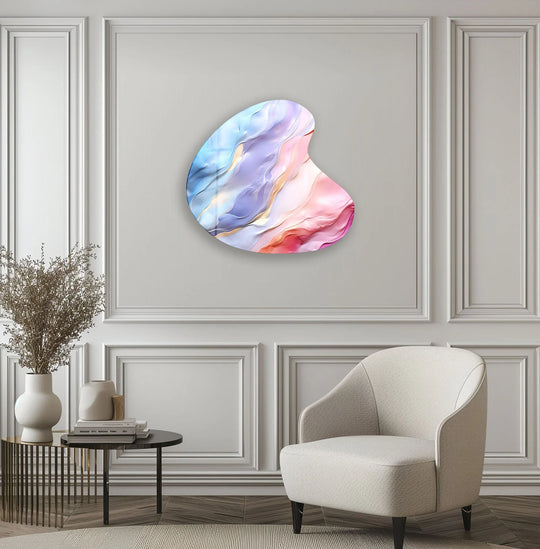 An abstract, irregularly shaped glass art painting with soft pinks, blues, and gold accents.