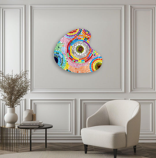 Irregular pink mosaic style glass wall art featuring vibrant, colorful patterns in a modern home decor setting.
