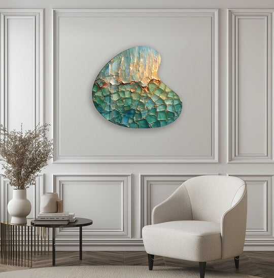 An abstract light green crayon irregular glass wall art with teal and gold hues, showcasing textured mosaic patterns.