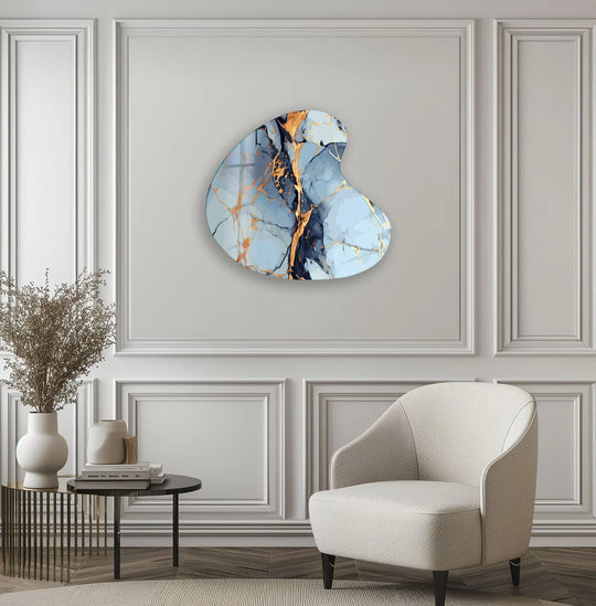 Pastel blue watercolor irregular glass wall art brightened by luminous gold veins.