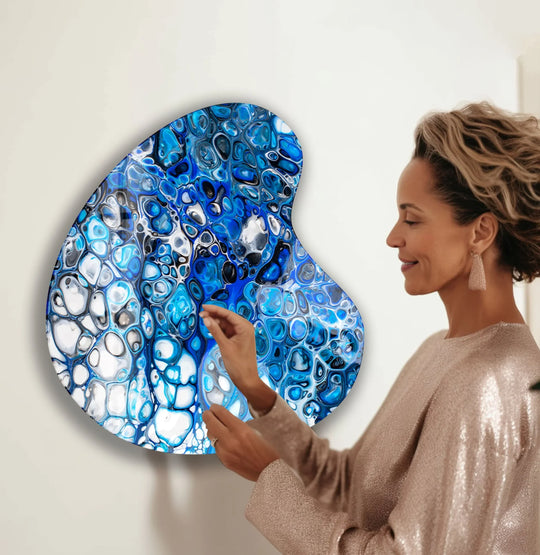 Stylish blue watercolor irregular glass wall art decor features a flowing abstract design with vibrant hues of sapphire and white cells.