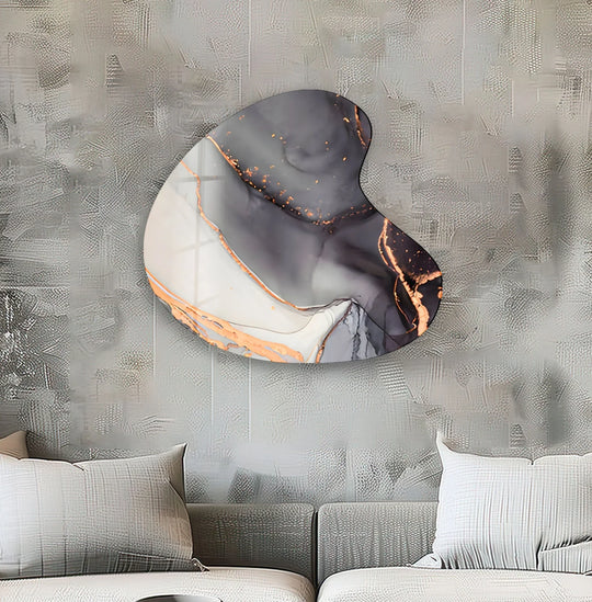 An irregular gray abstract style glass printing features swirling dark grays and white with metallic gold accents.