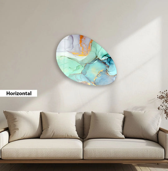 A light beige textured wall serves as the backdrop for a captivating oval glass print featuring swirling turquoise and gold abstract art.