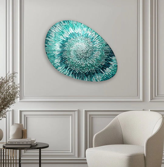 The turquoise helix abstract oval glass printing art showcases intricate depth and layers of vibrant turquoise and white hues radiating from its center.