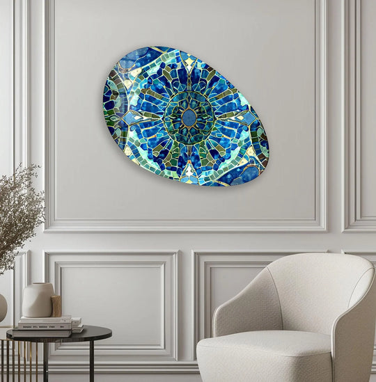 The best glass art features a vibrant mosaic pattern with contrasting shades of blue, green, and gold in an oval design.