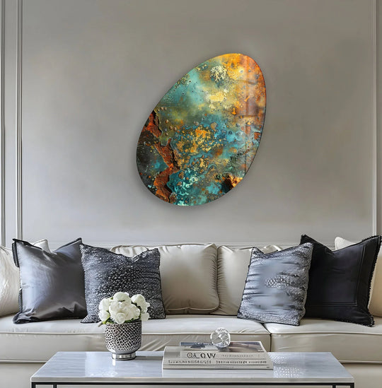 A captivating oval piece of best glass art showcasing a textured abstract pattern with vibrant turquoise, rust, and gold hues.