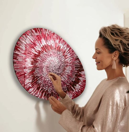 Captivating red abstract spiral glass wall art decor with vibrant, textured facets of rich crimson and rose.
