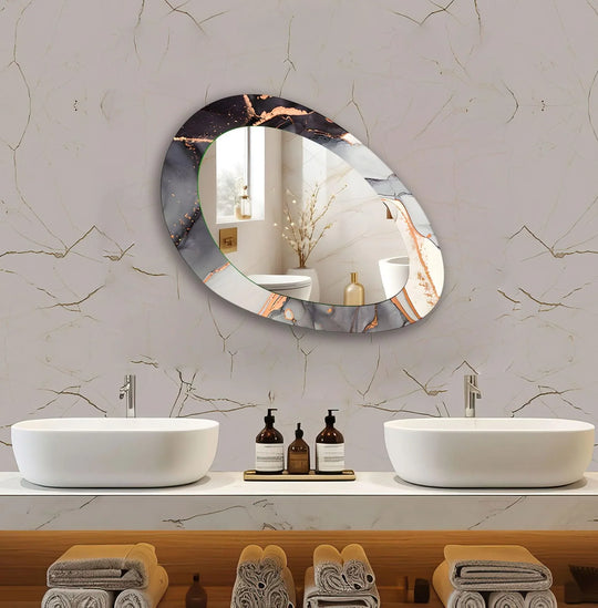 Asymmetric mirror with black gold and grey abstract patterns a long wall mirror and abstract mirror reflecting a modern bathroom on a marbled wall