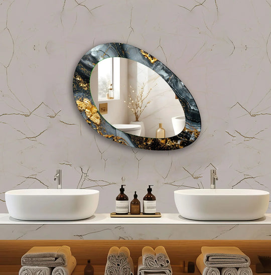 asymmetric mirror with a black and gold abstract design a decorative wall mirror and an irregular shape on a light patterned wall