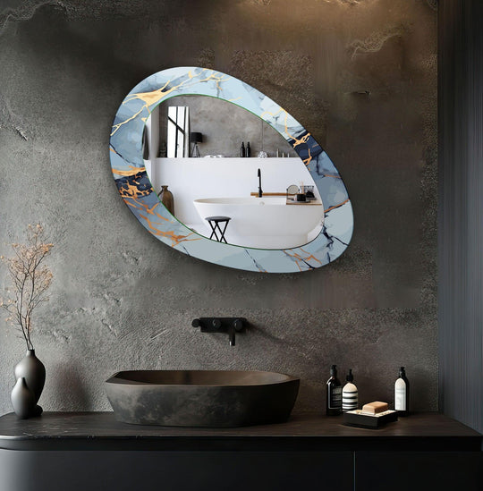 Asymmetric mirror featuring a blue abstract design and gold accents a small wall mirror for modern elegance on a dark grey wall
