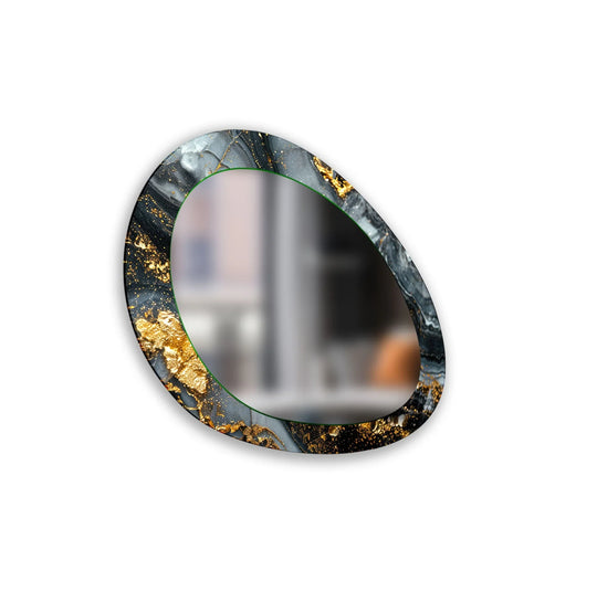 An asymmetric mirror with a bold black and grey abstract design and striking gold details a beautiful decorative wall mirror with a glass surface