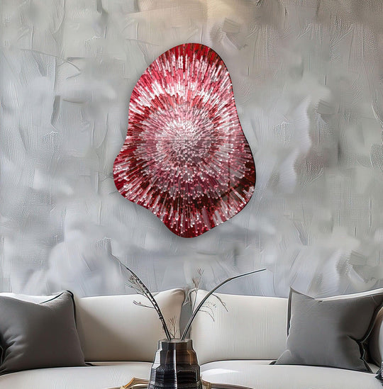 A textured abstract red helix design features on this captivating glass wall artwork with its detailed radial patterns and sharp edges.