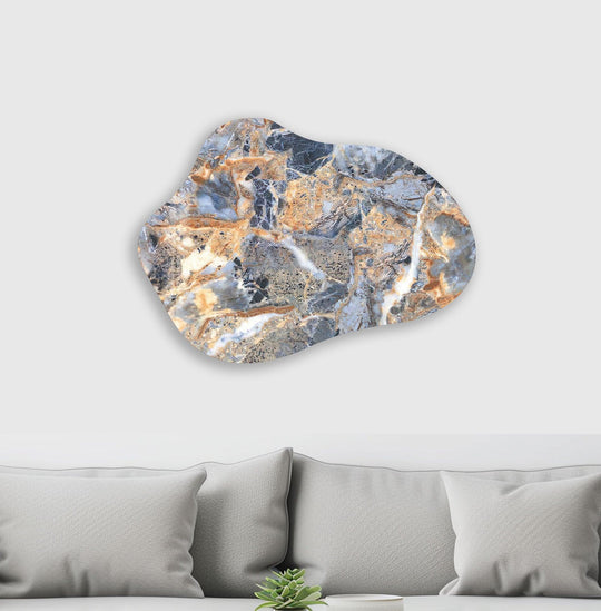 An abstract blue marble pattern on irregular glass wall art swirls with dynamic, organic movement.