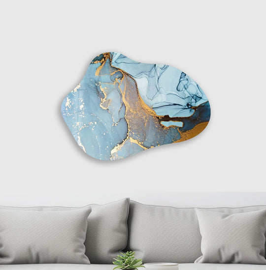 This unique modern wall decor showcases a striking contrast between deep navy blue and shimmering gold ink swirls against a light blue alcohol ink background.