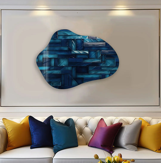 Abstract blue glass wall art decor mimics an organic, flowing form with segmented geometric patterns.