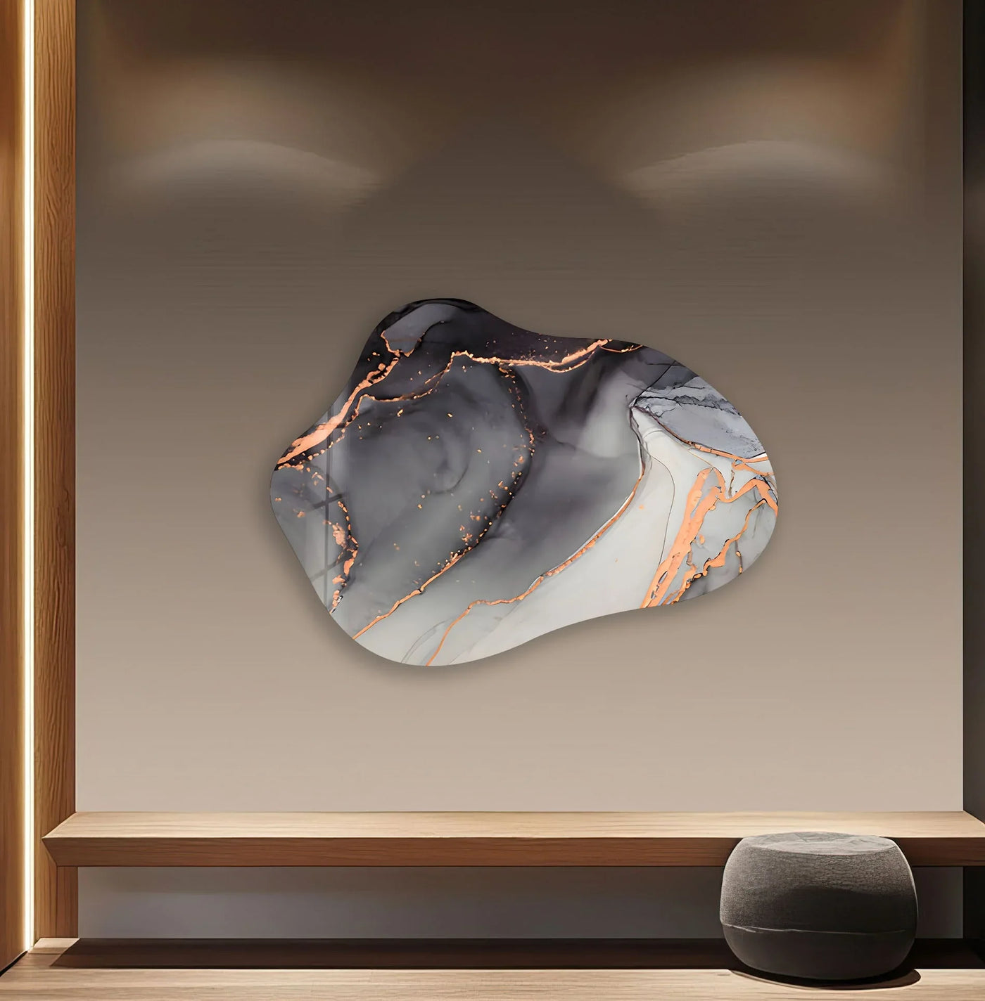 A close-up of abstract gray watercolor irregular glass wall artwork showcases realistic fluid details with subtle gold accents.