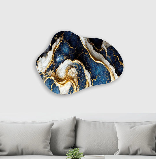 An abstract glass wall art piece with unique modern wall decor, featuring irregular geometric contours in swirling navy and gold marble patterns.