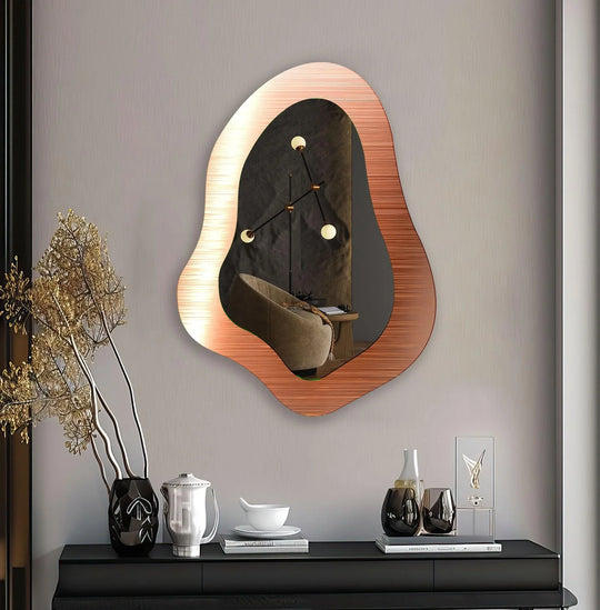 Featuring an orange finish, the elegant irregular wall mirror is a decorative bathroom mirror that adds a touch of contemporary style to any space.
