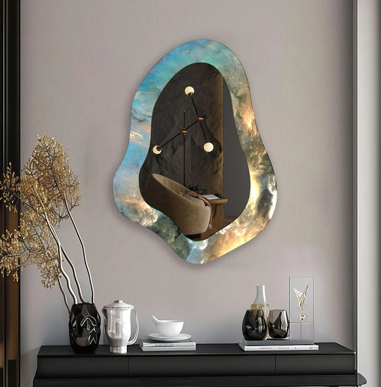 Abstract blue and yellow decorative asymmetric wall mirror with an irregular cloud motif reflecting a modern interior