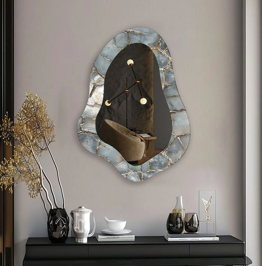 Irregular metallic grey wall mirror showing a stone-like surface texture around its frame, presenting it as a stunning framed wall mirror and decorative accent.