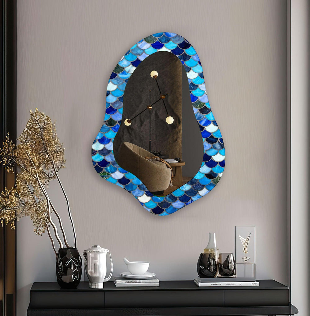 Decorative wall mirror blending artistic patterns with modern functionality for a unique look
