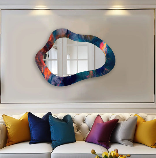 Deepest indigo hues define the sculptural silhouette of this abstract mirror for wall decor, reflecting light and adding modern artistry to the entryway.