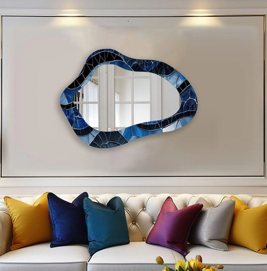 Highlighting the geometric elements, a blue stained glass wall mirror features asymmetrical, irregular shapes within its stained glass wall mirror design, creating a modern, decorative art piece.