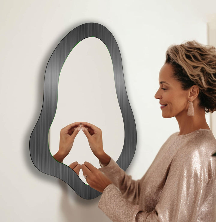 Decorative wall mirror with a contemporary design, perfect for adding elegance to any space
