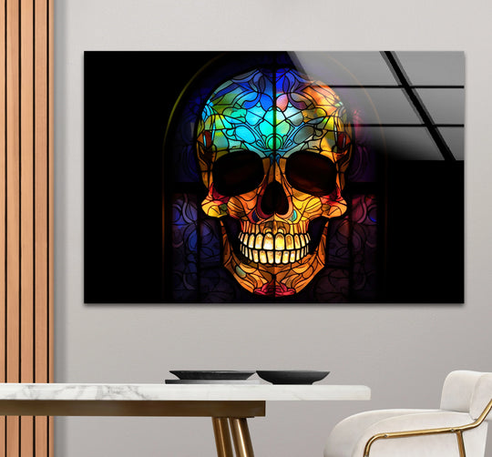 A dominant splash of vibrant yellows, blues, and oranges forms a Gothic skull glass wall artwork with a dark aesthetic window design.