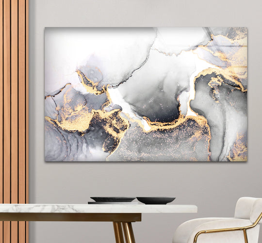 Flowing veins of gold and charcoal create a dynamic visual rhythm in this abstract glass wall art.