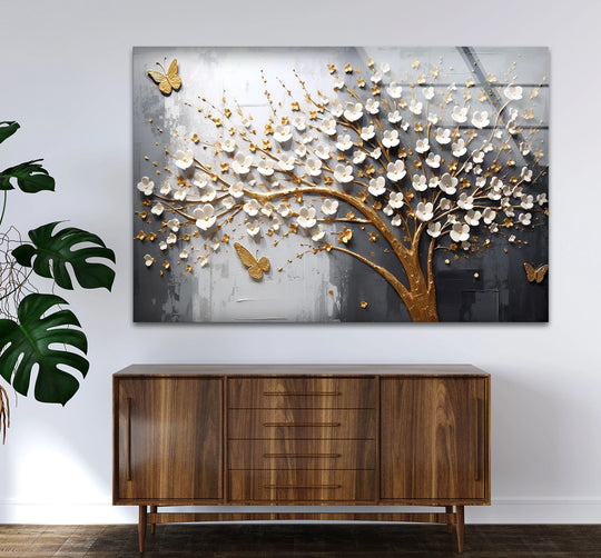 The geometric elements of the floral glass print showcase a 3D cherry blossom tree with golden accents and butterflies, highlighting its modern art from glass design.
