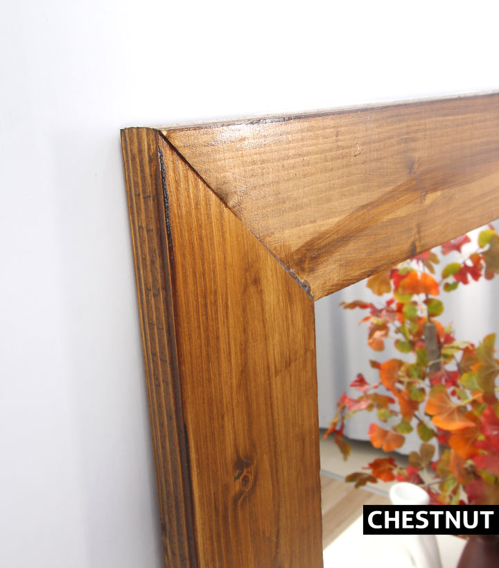 Schwarzer Wandspiegel aus Holz