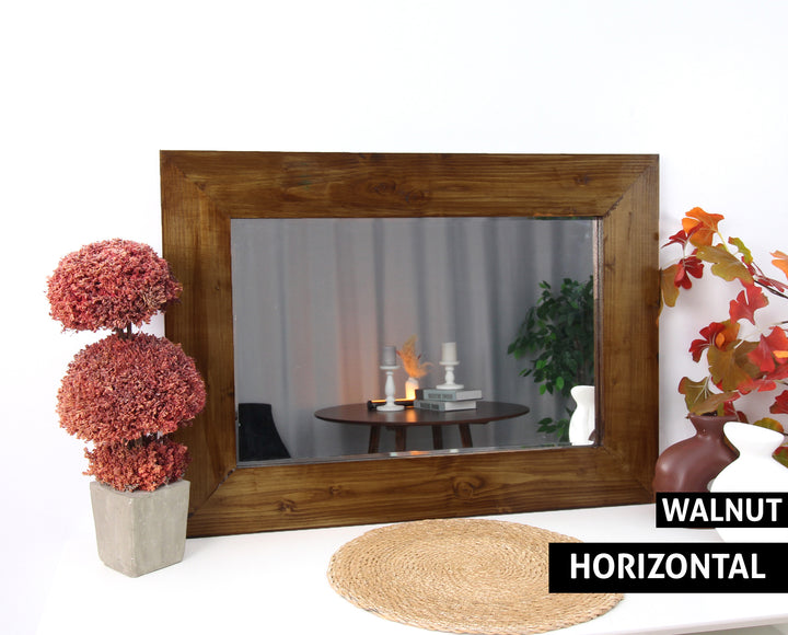 Schwarzer Wandspiegel aus Holz
