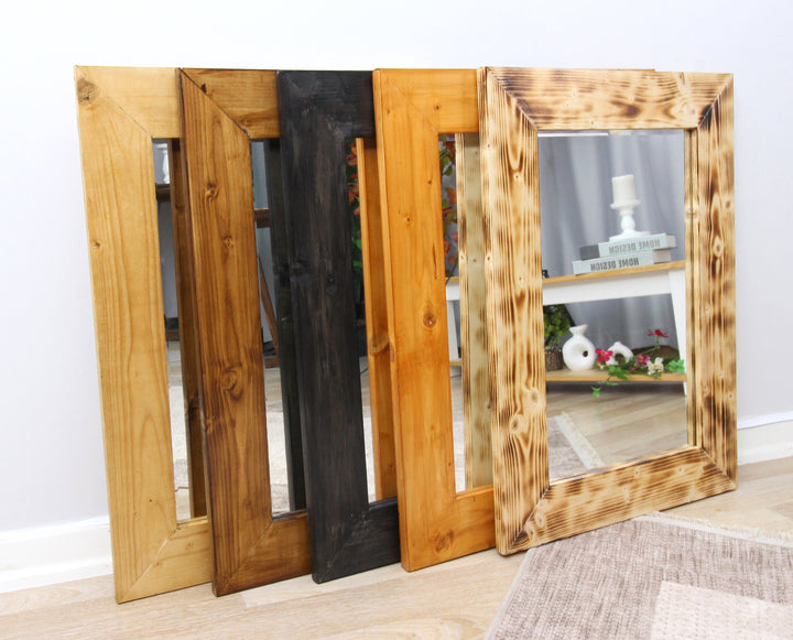 Schwarzer Wandspiegel aus Holz