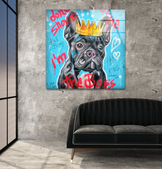 A rectangular hanging wall art piece showcases a regal French bulldog wearing a gold crown against a vibrant blue, graffiti-splattered background.