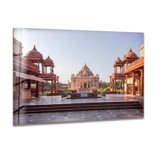 Light and shadow play across the glass wall art decor highlighting the architectural details of the Jaisalmer Cenotaphs and its magnificent structures.