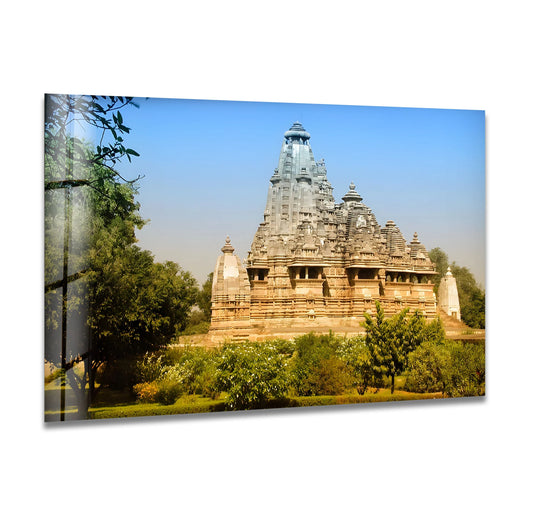 Featuring the realistic detail of India's Khajuraho temple architecture, this glass wall art showcases unique modern wall decor with striking clarity and intricate design.